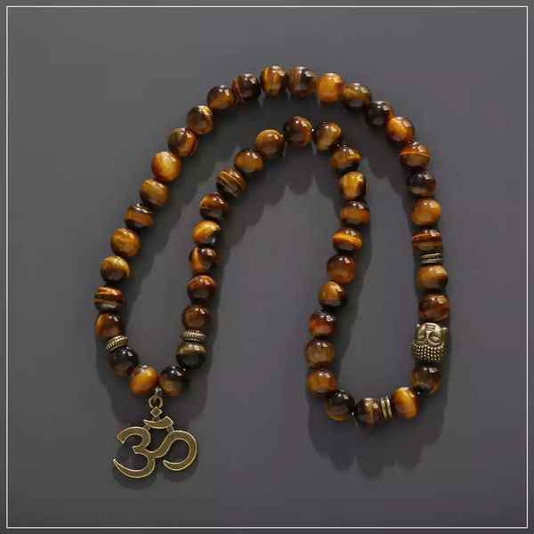 Pulsera con dijes de piedras de Buda